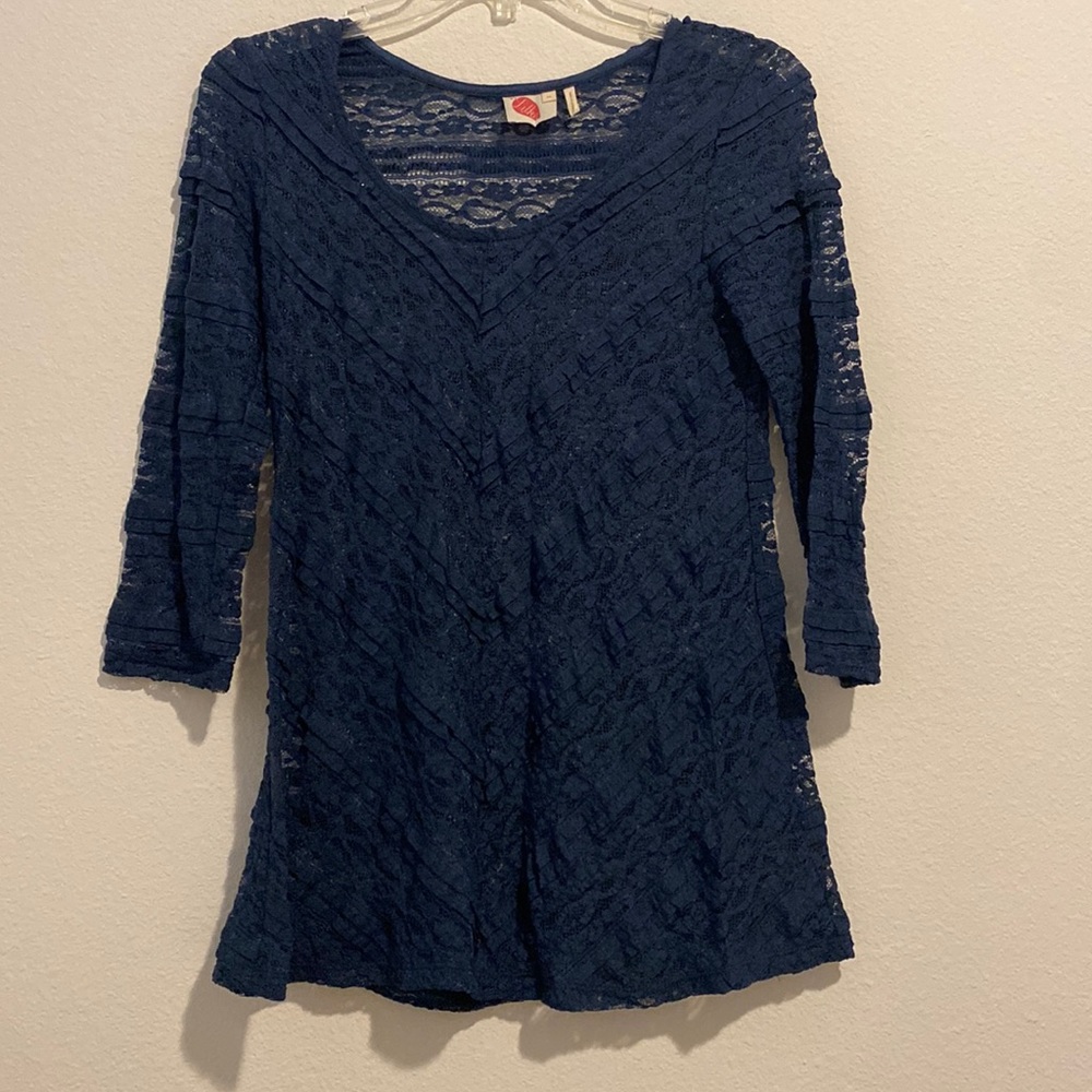 Lacy top with 3/4 length sleeves. Only worn a few times. Lilka brand size XS.